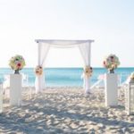 A wedding setting on a beach.